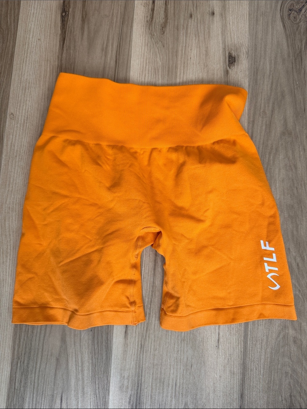 STLF High-Waist Orange Bike Shorts for Women